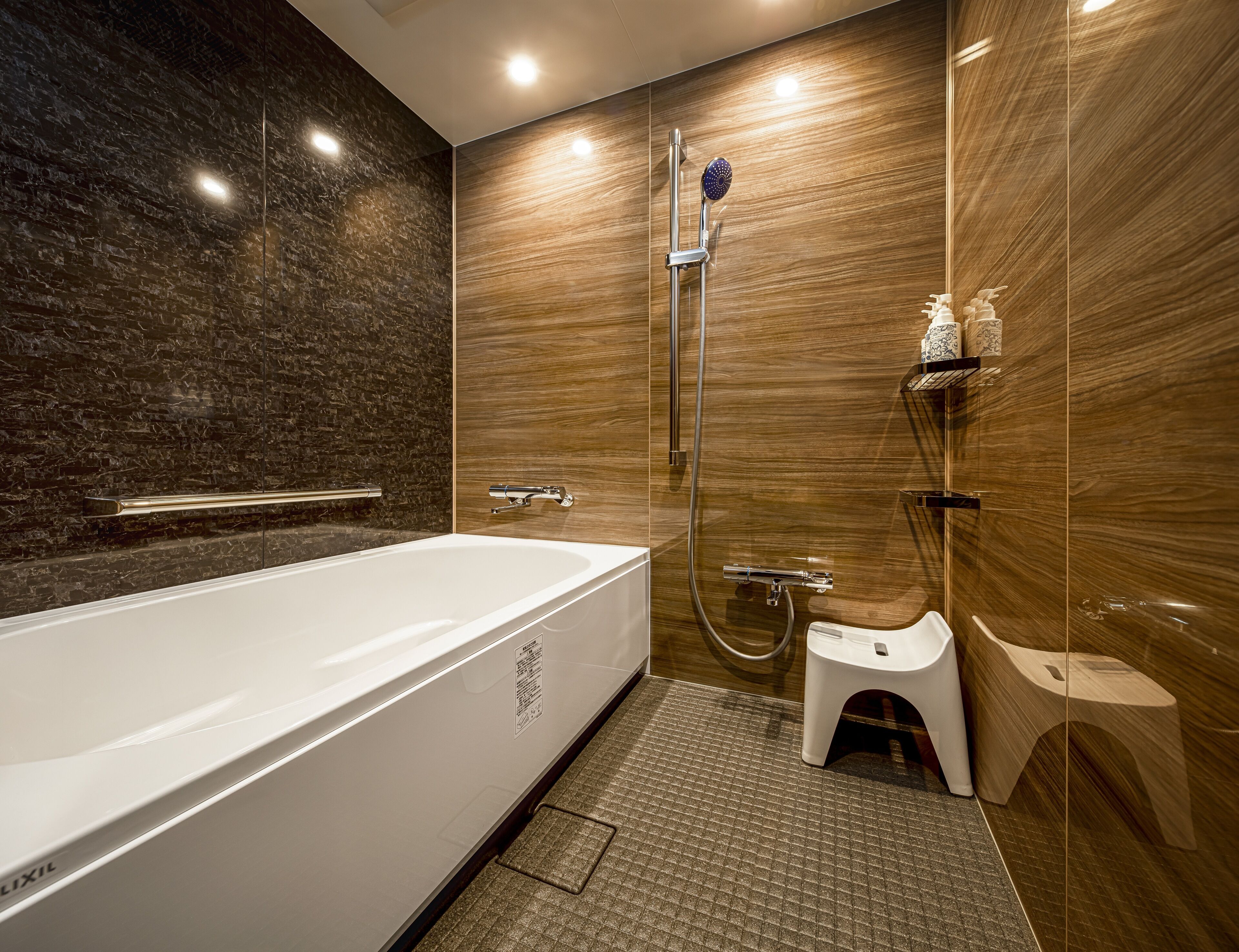 separate bathtub and shower, designer toiletries, hair dryer, slippers