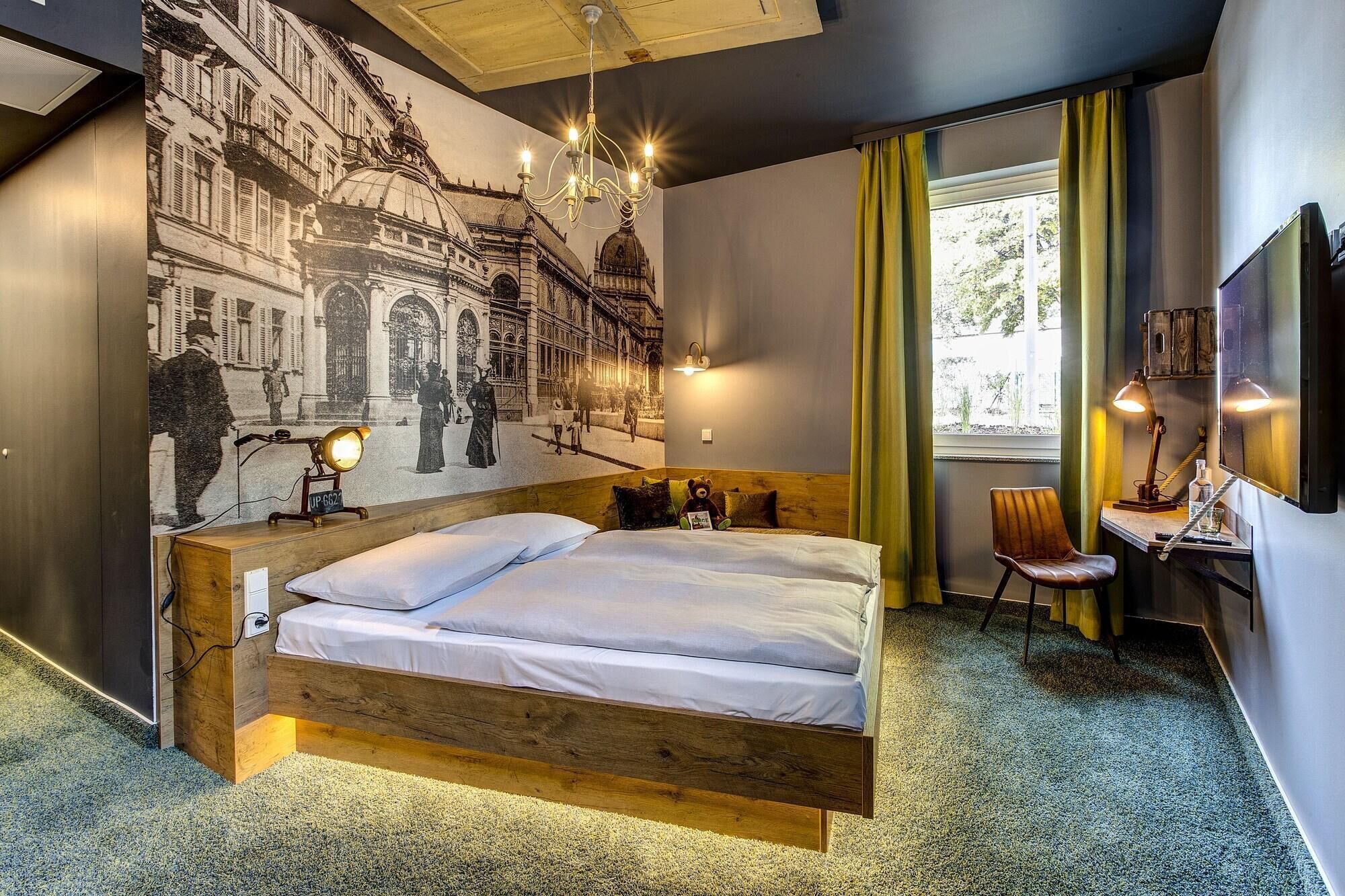 Hypo-allergenic bedding, desk, laptop workspace, blackout curtains