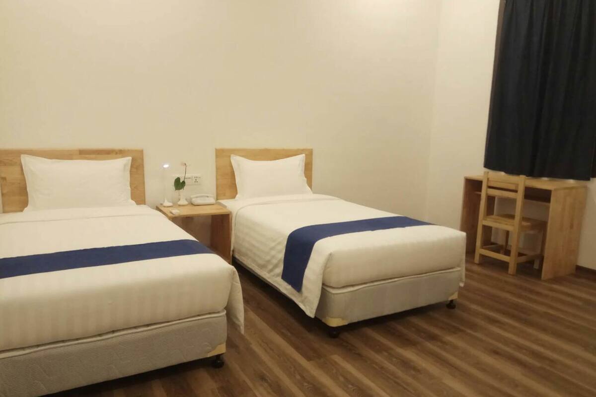 Habitación Deluxe con 2 camas individuales, 2 camas individuales | Minibar, wifi gratis, ropa de cama