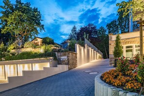 Enter a serene oasis with a beautifully maintained pathway leading to our welcoming reception area.