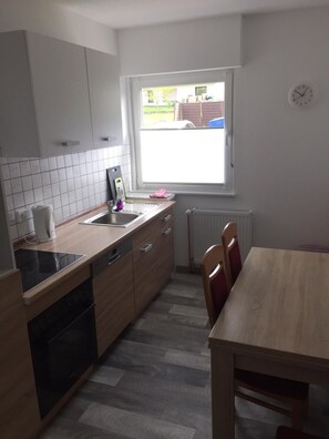 Apartment, 2 Bedrooms | Private kitchen | Full-size fridge, stovetop, electric kettle, cookware/dishes/utensils - Alexanders Ferienwohnungen (Wenden)