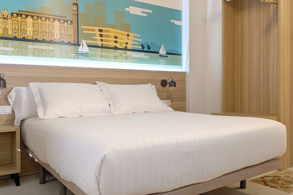 Down comforters, memory foam beds, WiFi (free), bed sheets