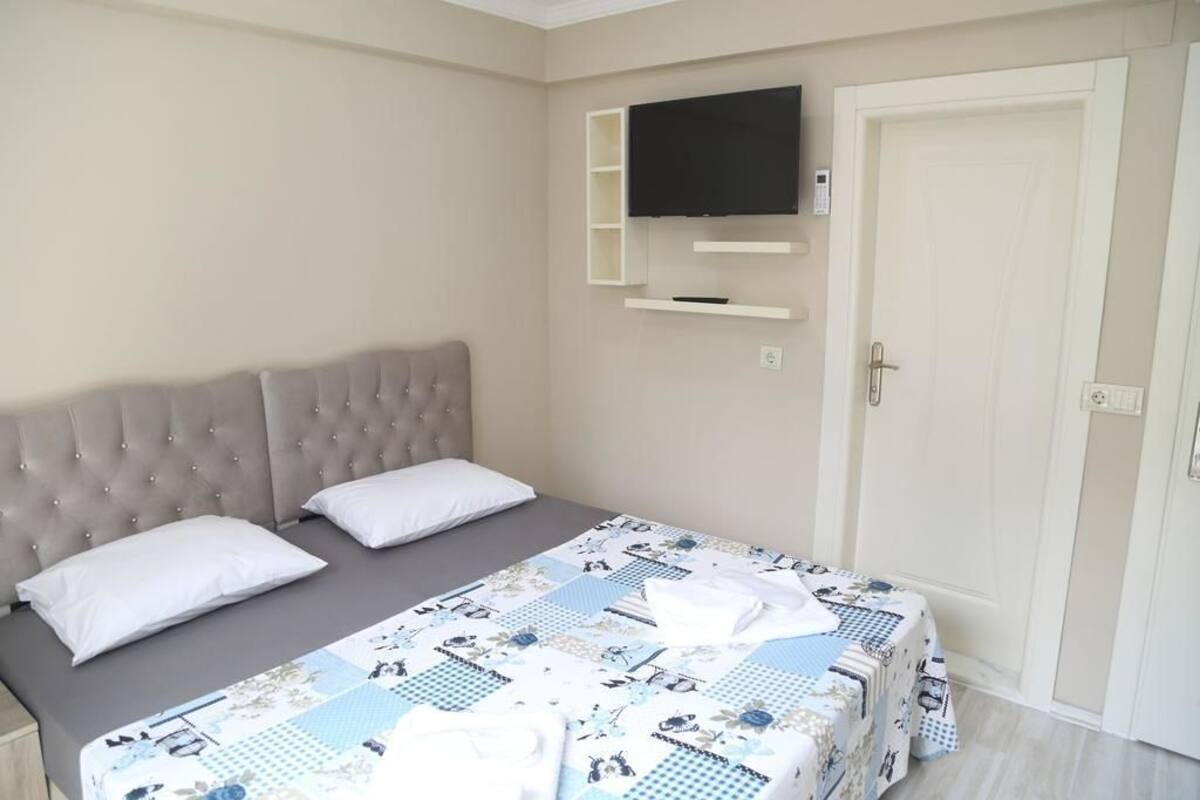 Desk, blackout curtains, iron/ironing board