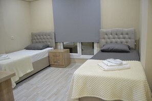 Desk, blackout curtains, iron/ironing board
