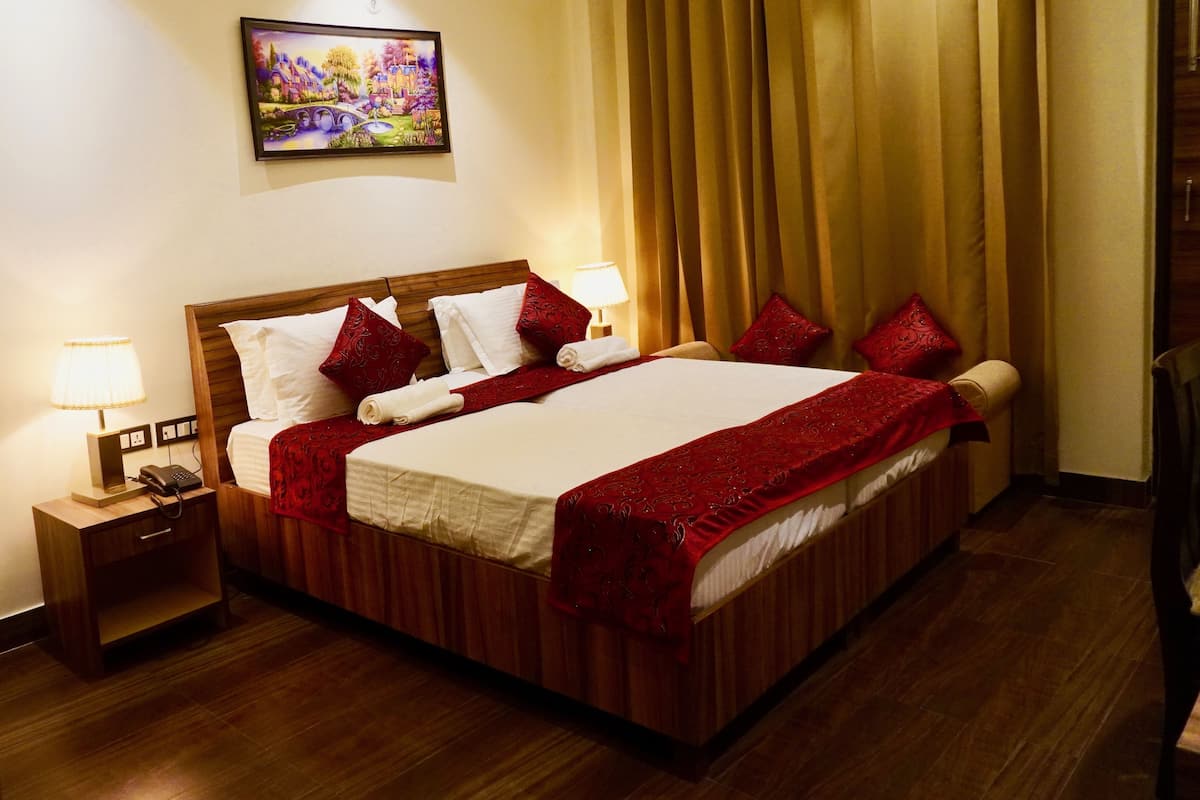 Desk, laptop workspace, blackout curtains, rollaway beds