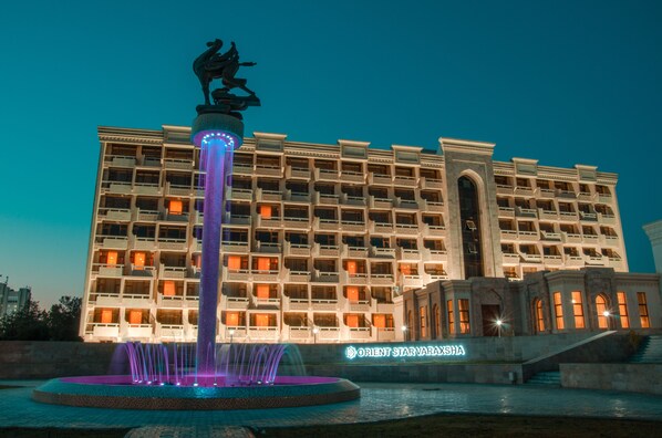 Front of property - evening/night - Orient Star Varaxsha (Bukhara)