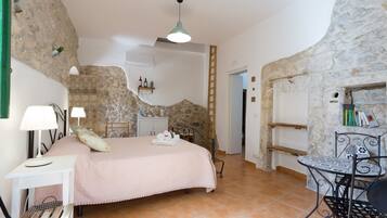 Quadruple Room | 1 bedroom, in-room safe, desk, blackout drapes