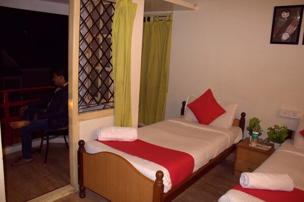 Minibar, desk, laptop workspace, blackout curtains - Nachis BnB (Bengaluru)