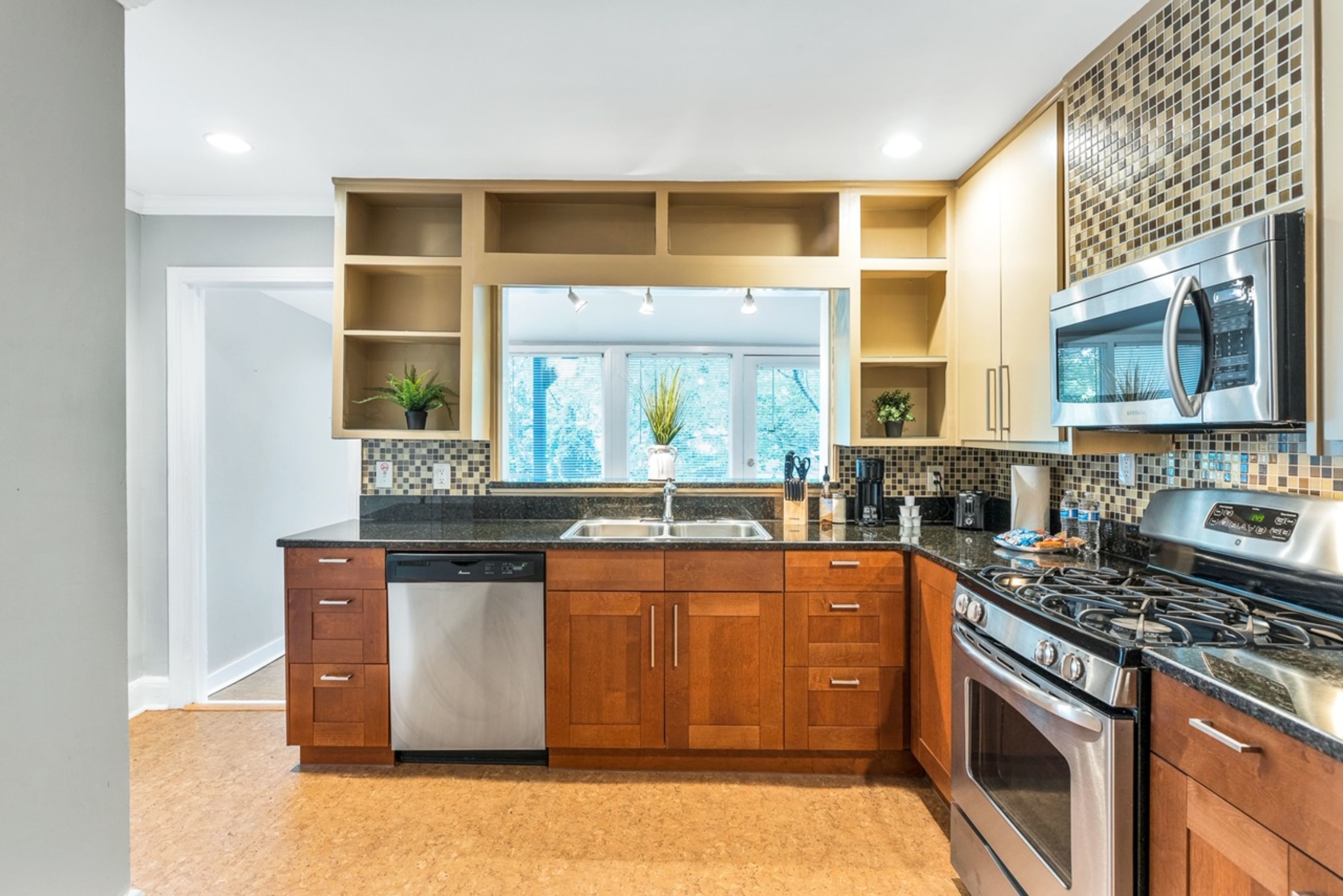 Charming LaVista bungalow | Private kitchen | Full-size fridge, microwave, oven, stovetop