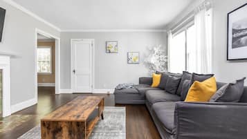 Charming LaVista bungalow | Living room | Flat-screen TV