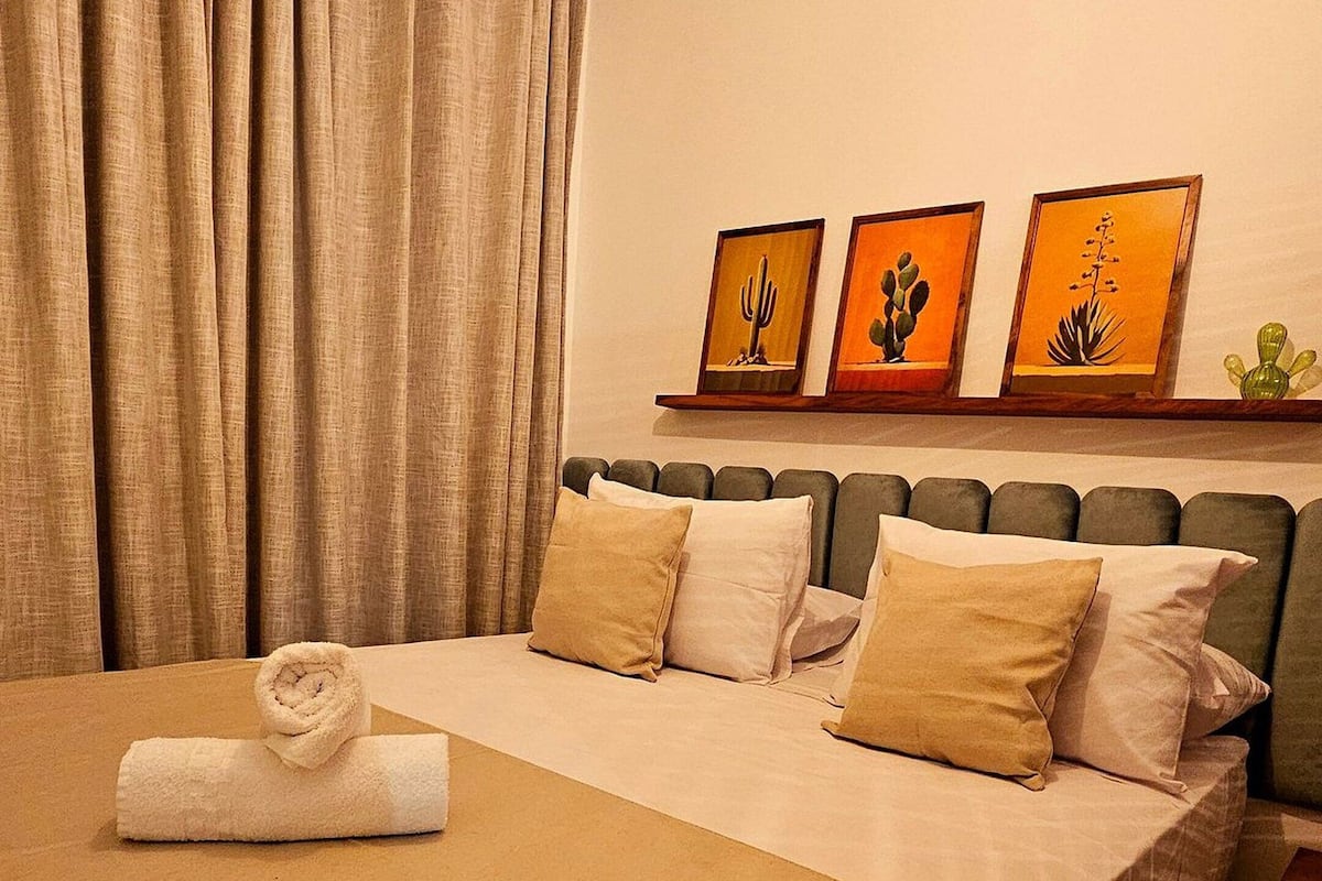 Apartamento | 1 dormitorio, cortinas opacas, wifi gratis y ropa de cama