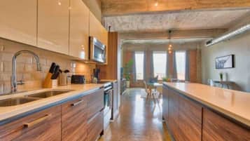 Radiant Downtown Luxury Loft | Living room | Flat-screen TV