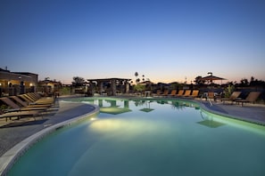 Outdoor pool, open 7:00 AM to 9:00 PM, pool umbrellas, pool loungers