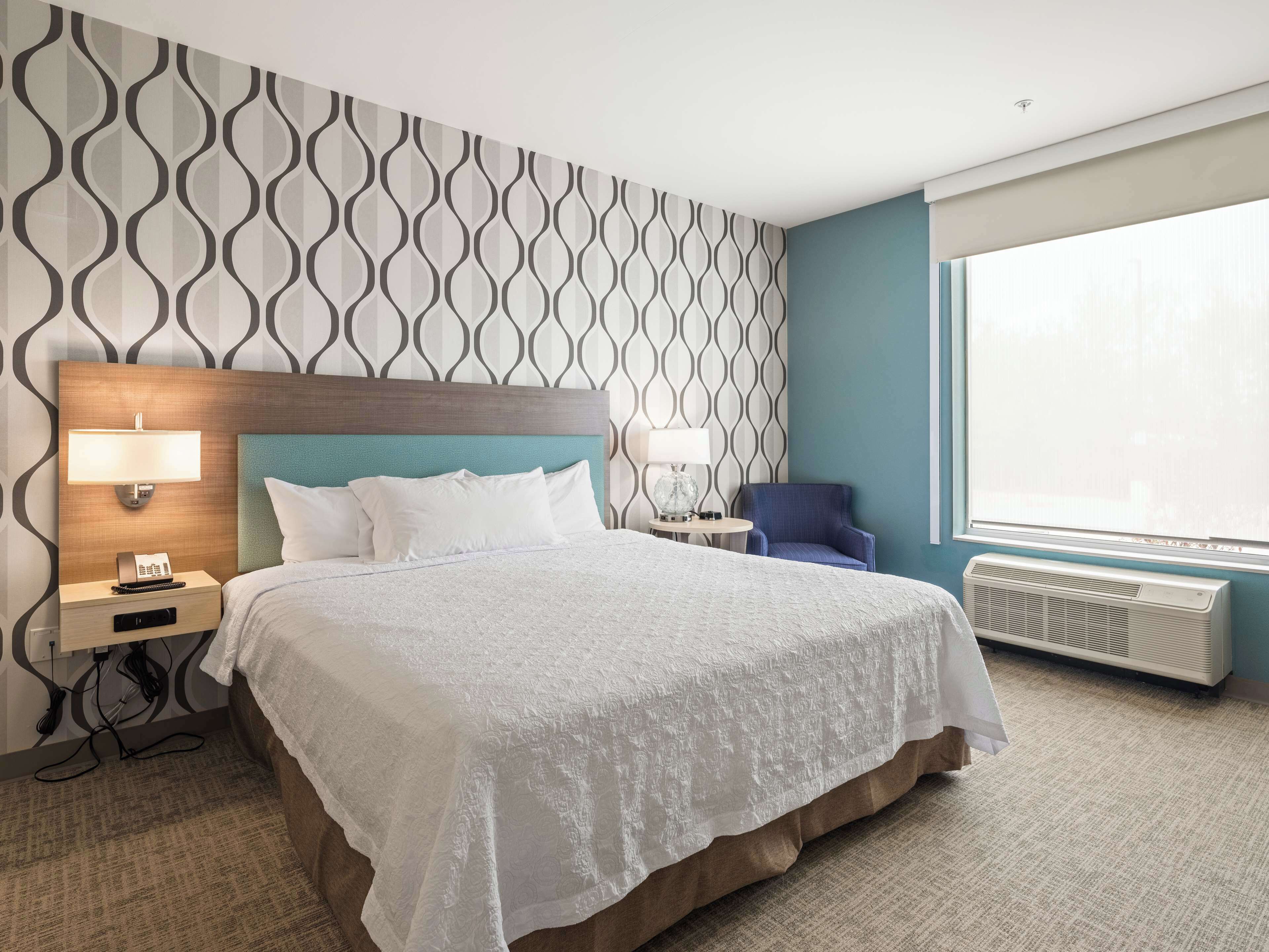 suite, 1 bedroom, non smoking | individually furnished, desk, iron/ironing board, free cots/infant beds