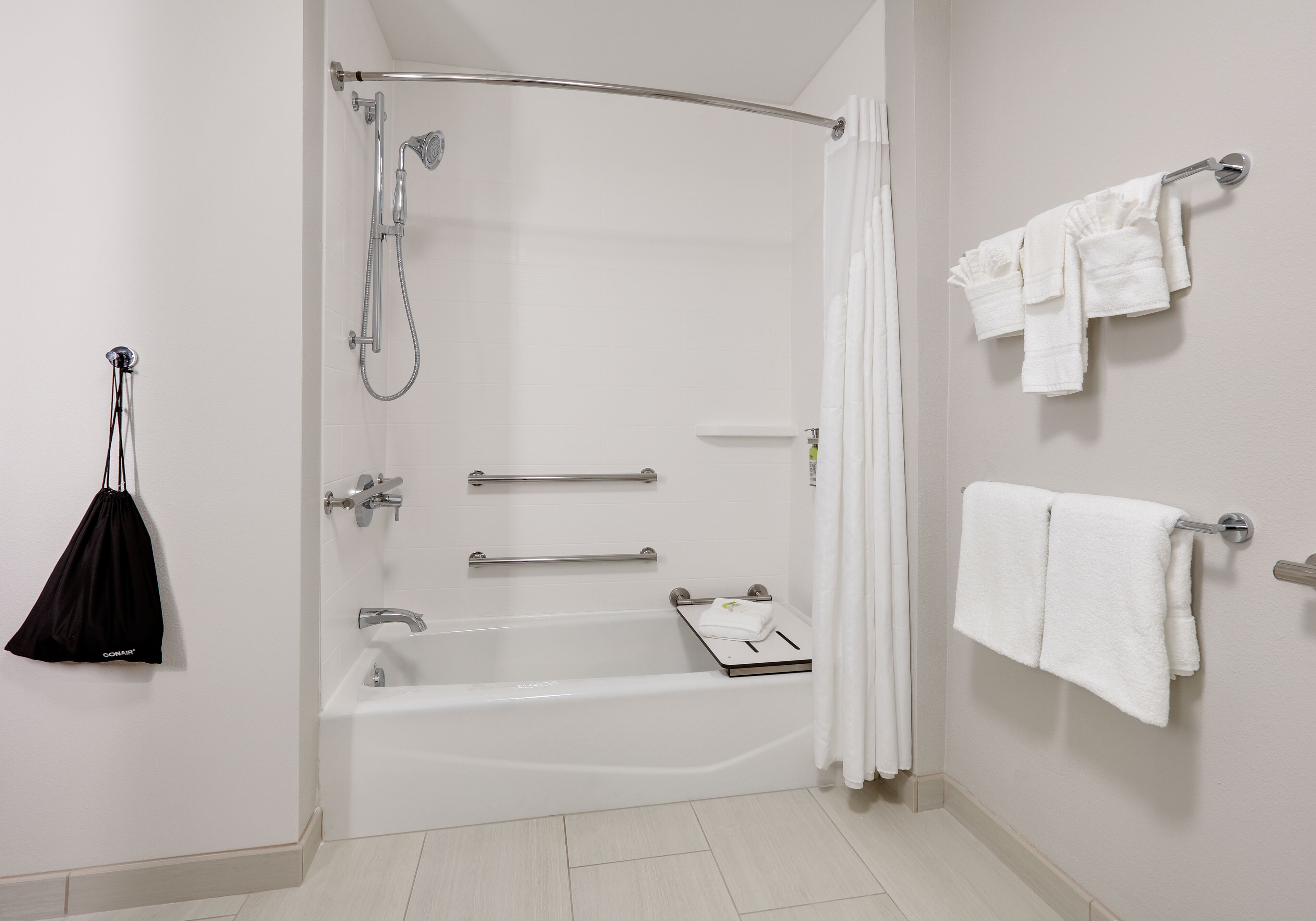 combined shower/bathtub, free toiletries, hair dryer, towels