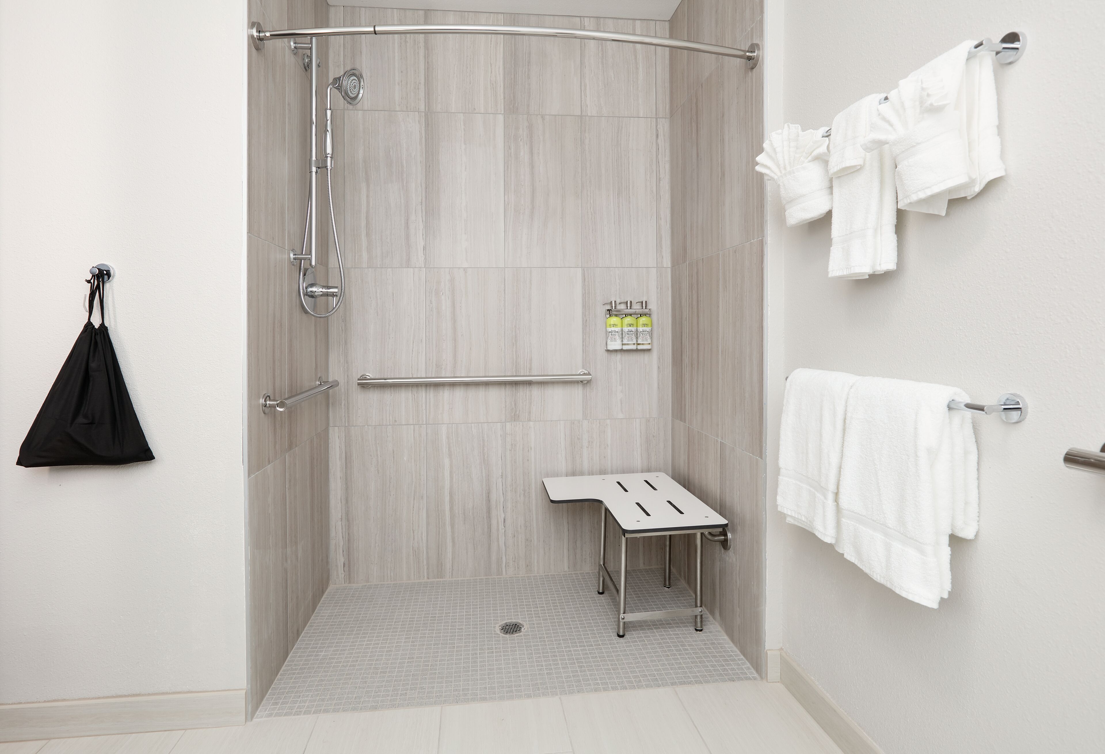 combined shower/bathtub, free toiletries, hair dryer, towels