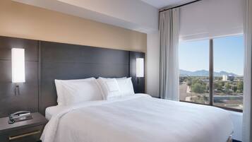 Desk, laptop workspace, blackout drapes, iron/ironing board