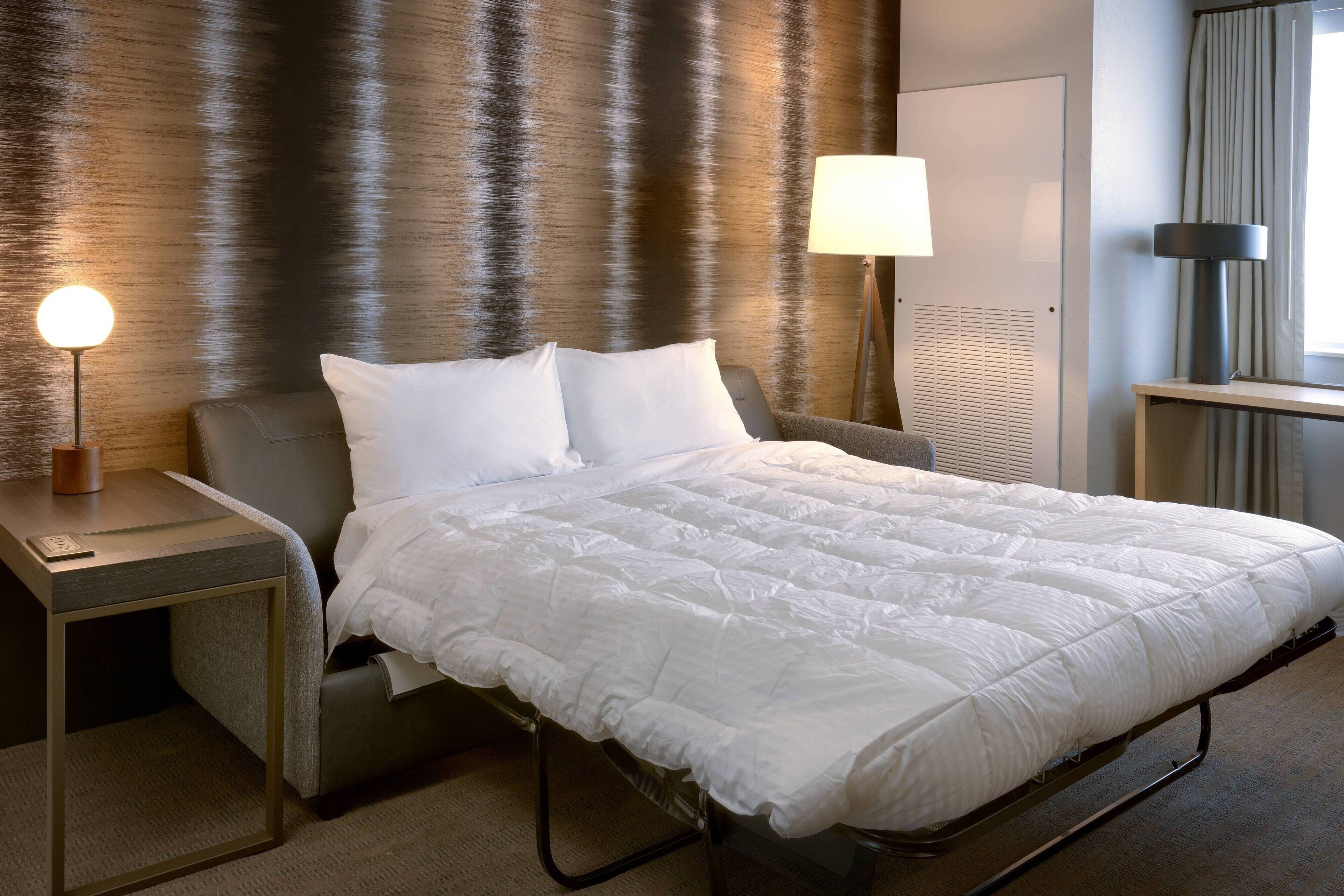 desk, laptop workspace, blackout curtains, iron/ironing board