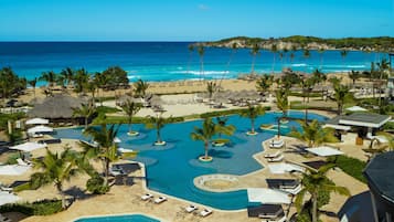 4 outdoor pools, open 7:00 AM to 6:00 PM, pool loungers
