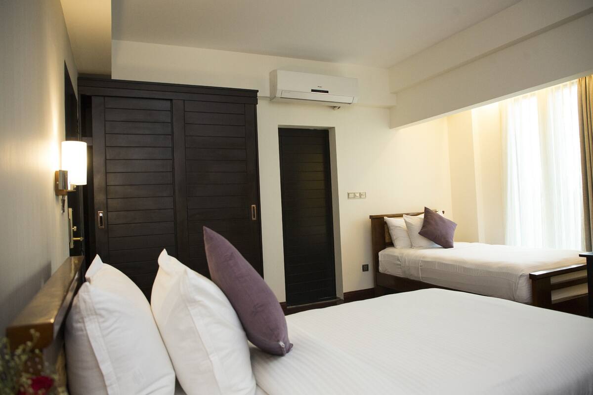 豪華客房, 2 張單人床 (Deluxe Twin Room) | 義大利 Frette 床單、高級寢具、羽絨被、舒適加層