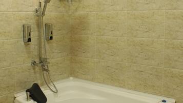 Family Apartment, Private Bathroom | Bathroom | Combined shower/tub, hair dryer, towels, soap