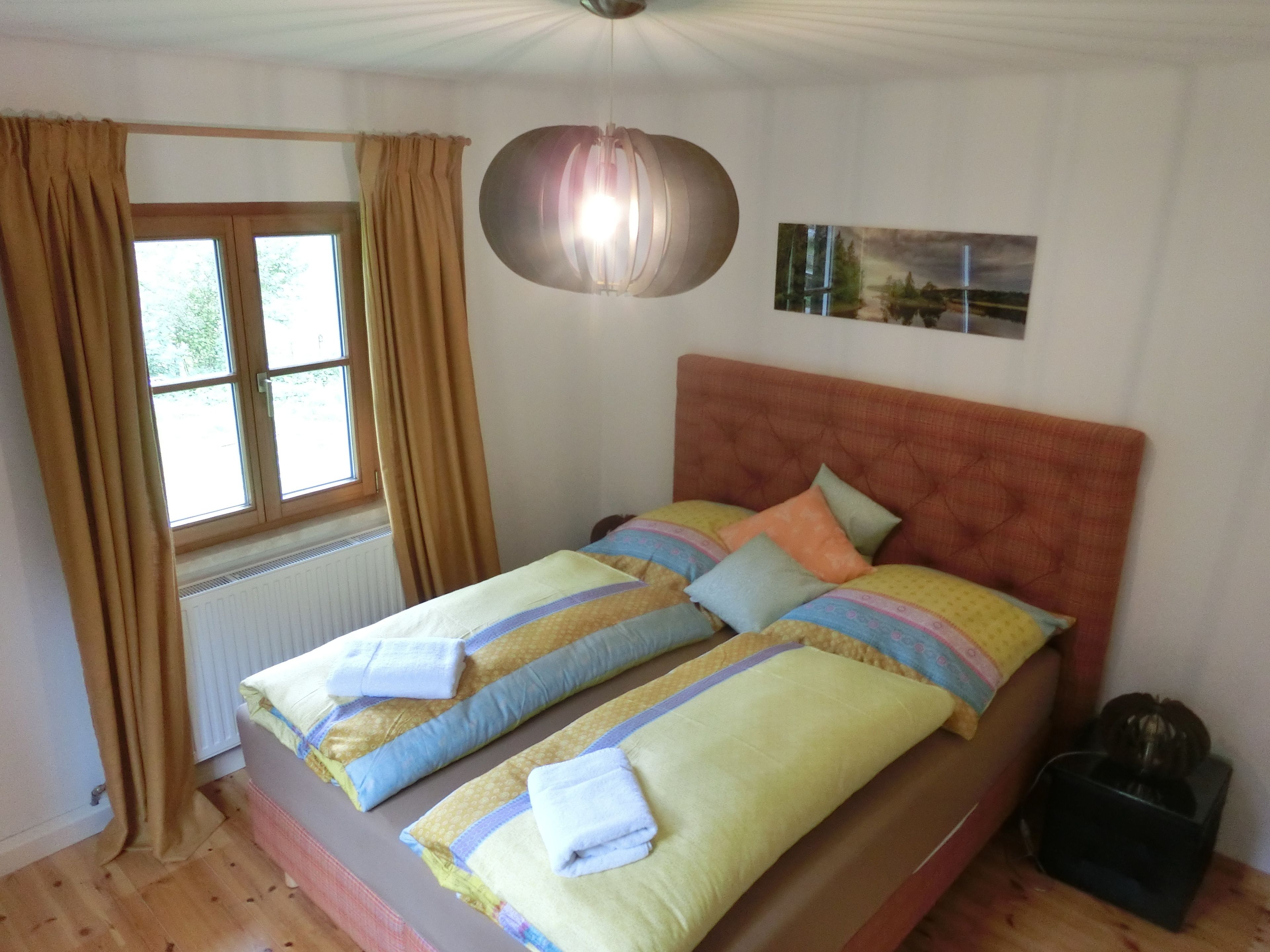 Premium bedding, desk, laptop workspace, iron/ironing board