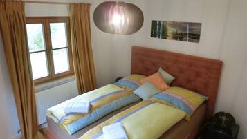 Premium bedding, desk, laptop workspace, iron/ironing board