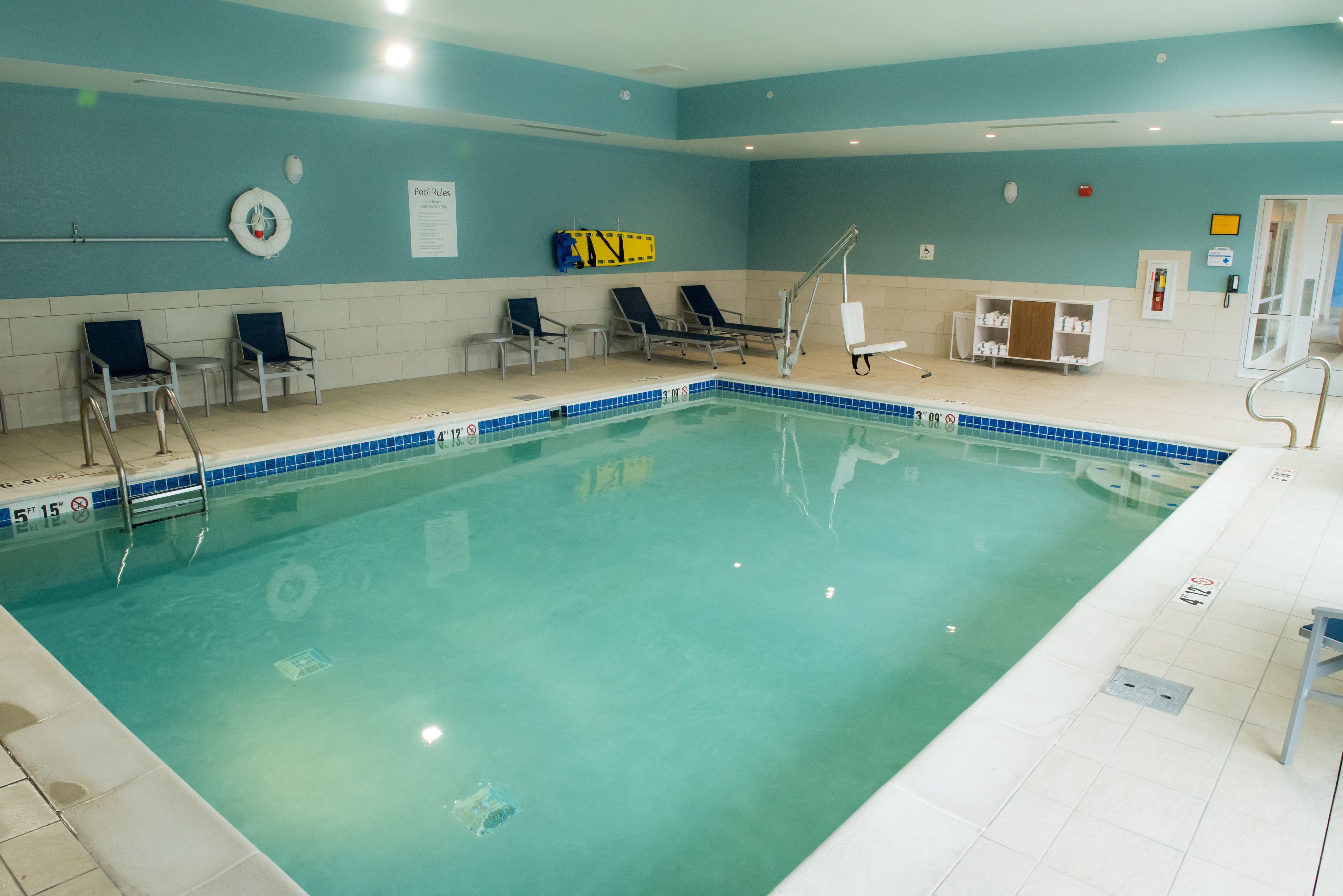 indoor pool, open 10:00 am to 10:00 pm, pool loungers