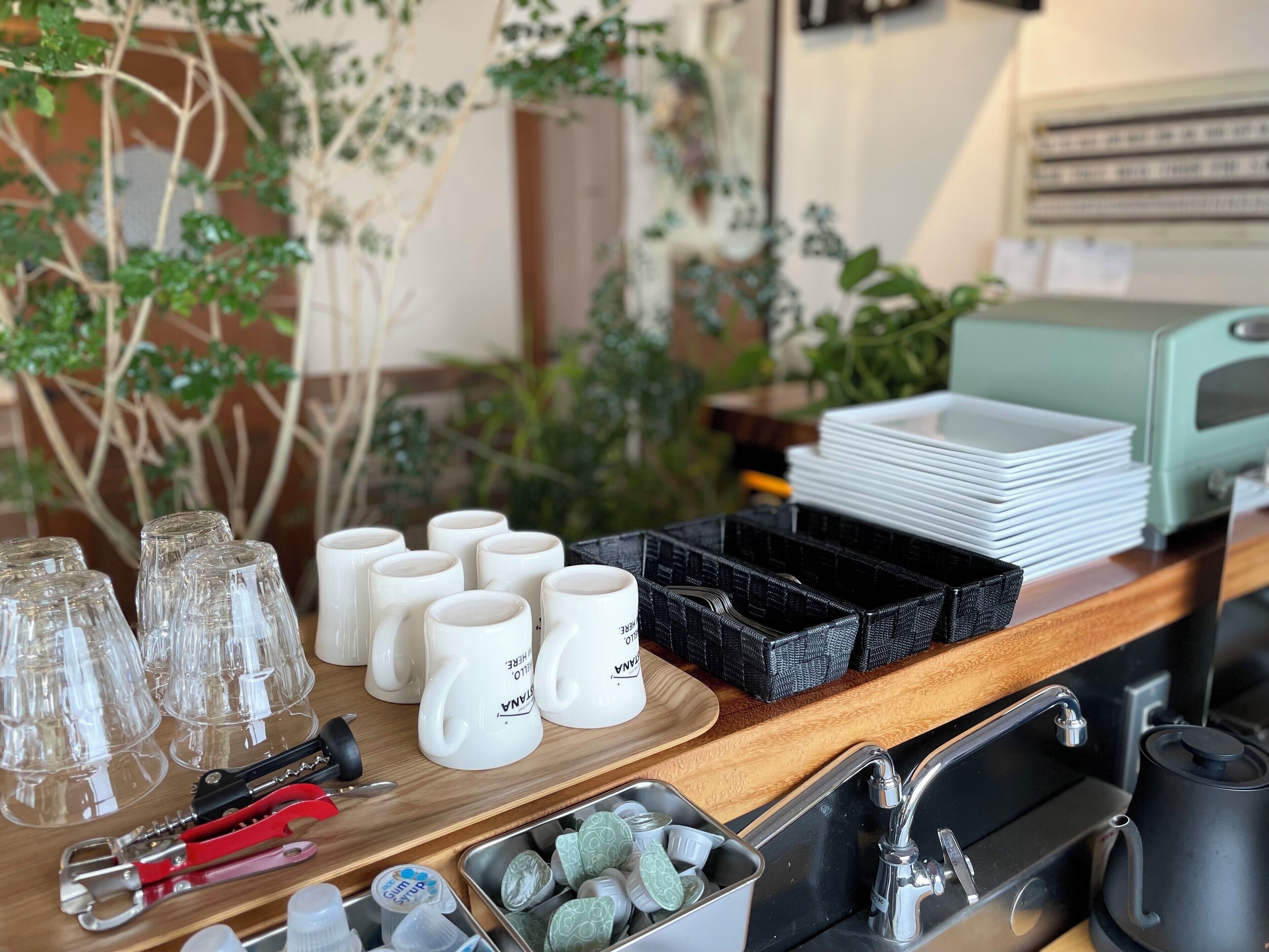 mini-fridge, microwave, stovetop, coffee/tea maker