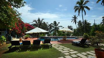 Outdoor pool, pool umbrellas, pool loungers