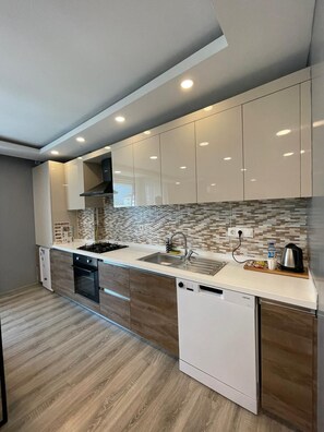 Family Condo, 2 Bedrooms | Private kitchen | Fridge, stovetop, coffee/tea maker, electric kettle - On4 Rooms & Suites (Istanbul)