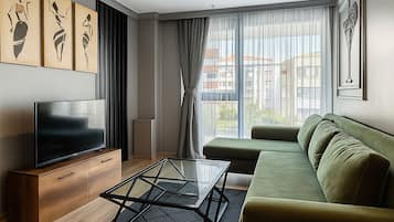 Appartamento Luxury, 1 camera da letto | Area soggiorno | TV LCD 109 pollici con canali satellitari, TV