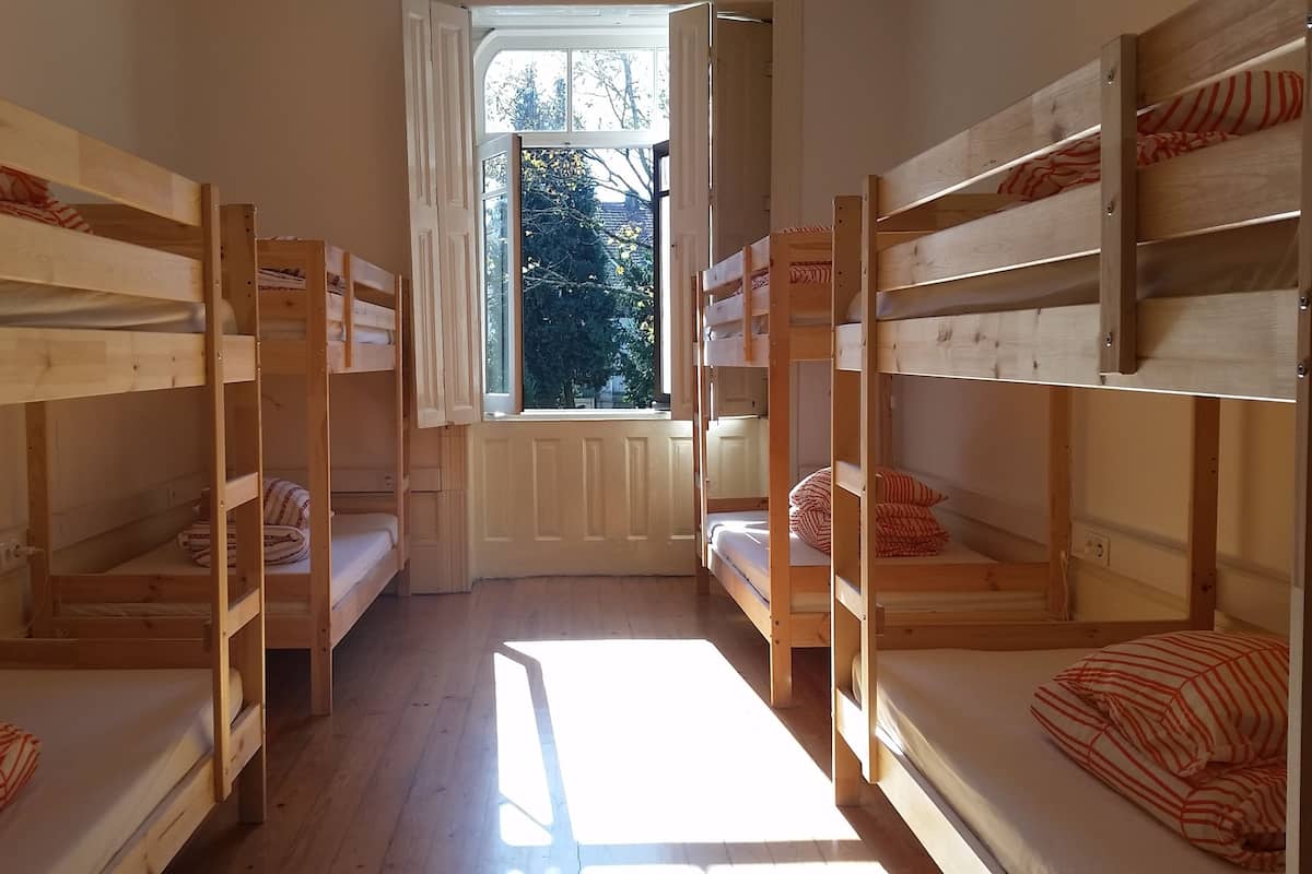 Bed in a Shared Mixed Dormitory ( 10 pax) | Free WiFi, bed sheets