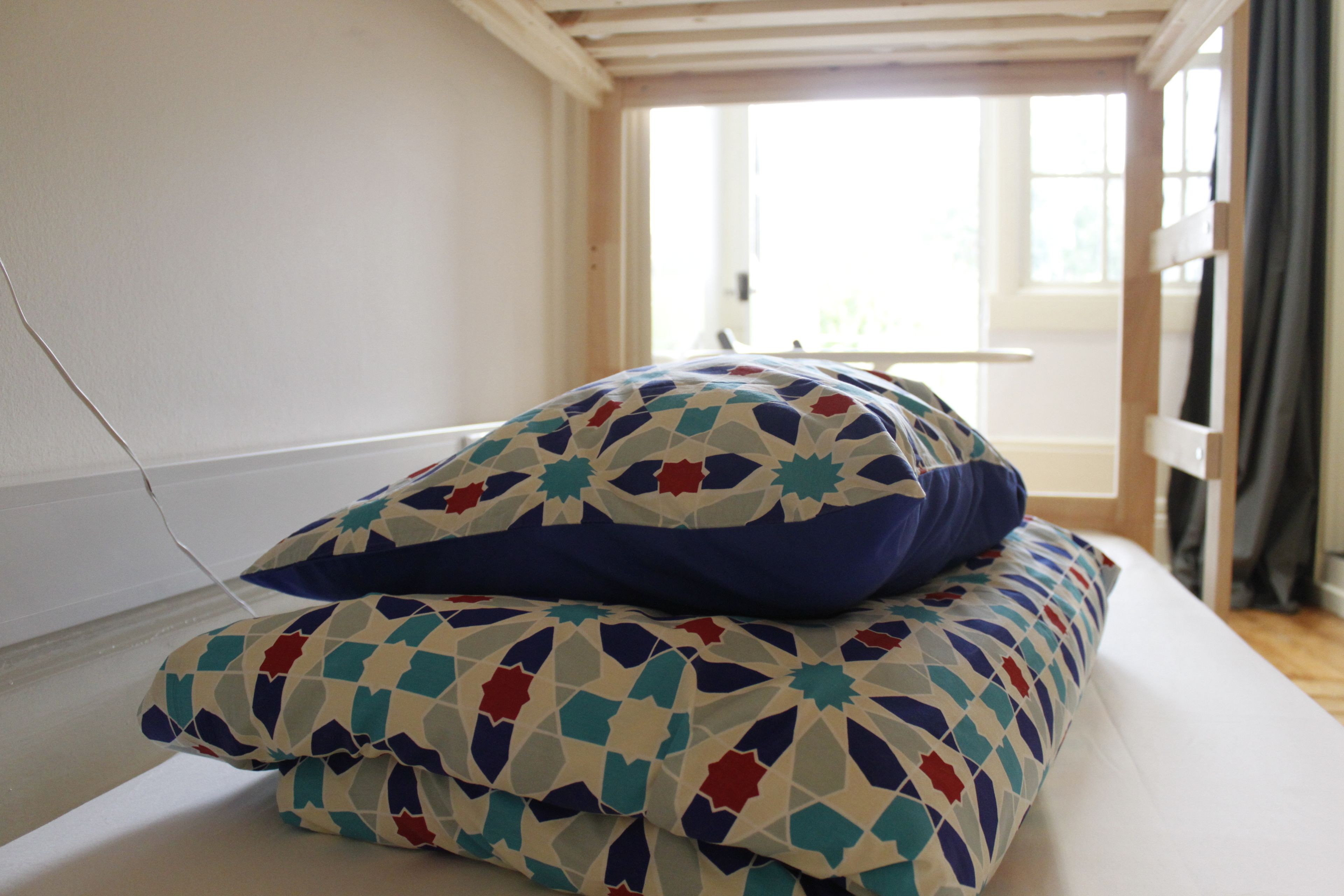 Bed in a Shared Mixed Dormitory ( 8 pax) | Free WiFi, bed sheets