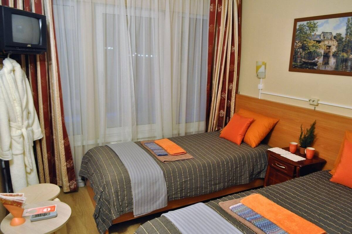 Chambre Deluxe avec lits jumeaux | 1 chambre, fer et planche Ă repasser, accĂšs au Wi-Fi (inclus)