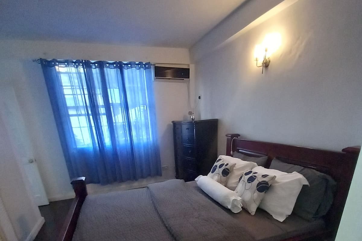 Panoramic Condo | 2 bedrooms, individually furnished, iron/ironing board, free WiFi