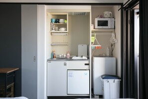 Deluxe Twin kamer | Individueel gedecoreerd, een bureau, verduisterende gordijnen