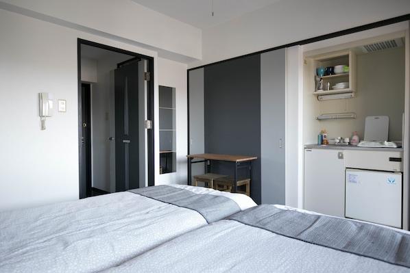 Deluxe Twin kamer | Individueel gedecoreerd, een bureau, verduisterende gordijnen