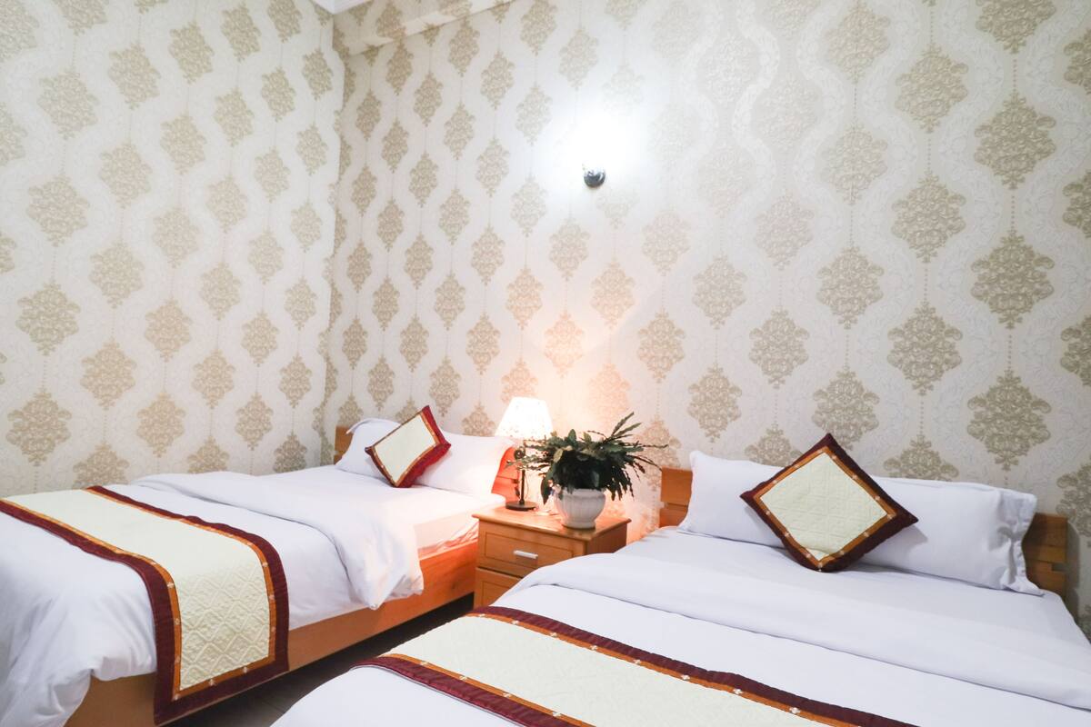 Economy Quadruple Room | 1 bedroom, minibar, desk, blackout curtains