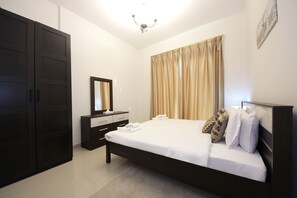Appartement | 1 chambre, coffres-forts dans les chambres, rideaux occultants