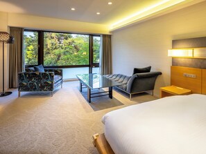 Chambre avec lits jumeaux (Moderate, B) | Coin séjour