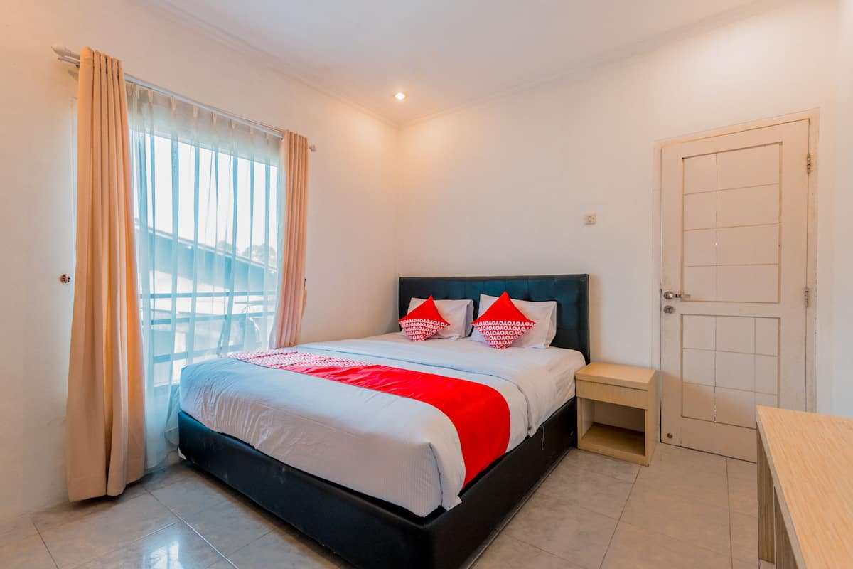 Habitación doble Deluxe | 1 habitación, escritorio, wifi gratis y ropa de cama