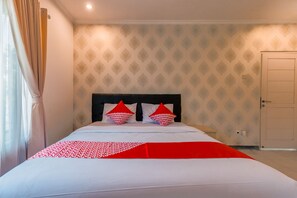 Suite Deluxe | Bureau, accès au Wi-Fi (inclus), literie fournie