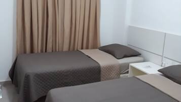 Family Room | 1 bedroom, premium bedding, individually furnished, desk