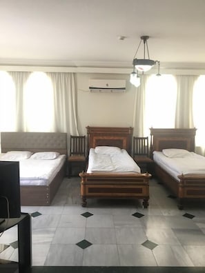 Premium bedding, down duvets, individually decorated