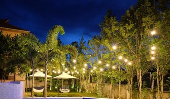 Outdoor pool, open 7:00 AM to 10:00 PM, sun loungers