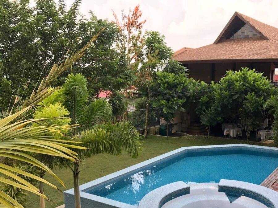 Outdoor pool, open 7:00 AM to 10:00 PM, sun loungers