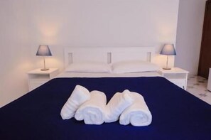 Egyptian cotton sheets, premium bedding, down duvets, minibar