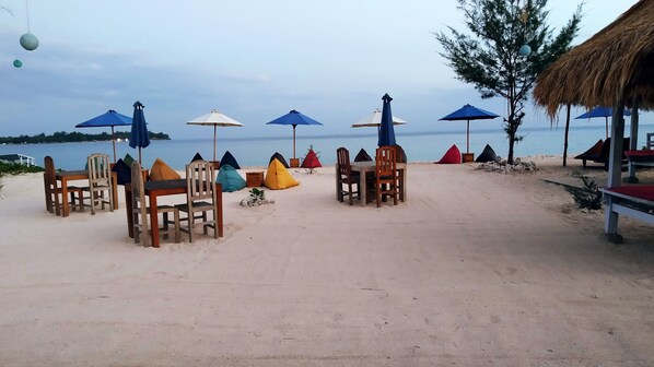 On the beach, white sand