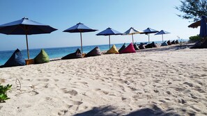 On the beach, white sand - Sunset Beach Bungalow & Restaurant (Gili Meno)